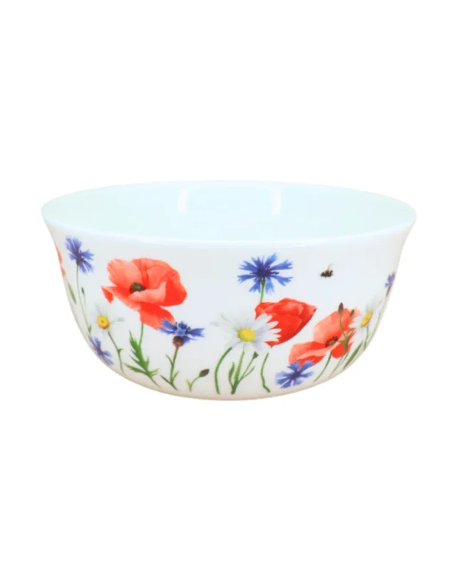 Große weiße Keramik-Müslischale mit Blumenmotiv (Mohnblumen, Kornblumen, Gänseblümchen) der Marke Grätz Verlag, isoliert auf weißem Hintergrund.