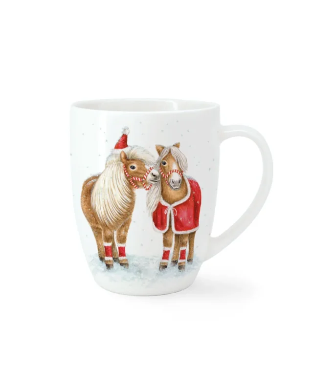 Vorderseite der Maluu Porzellantasse Jolly Ponies mit zwei liebevoll illustrierten Ponys, eines mit Weihnachtsmütze und beide mit rot-weißem Halfter, umgeben von feinen Schneeflocken.