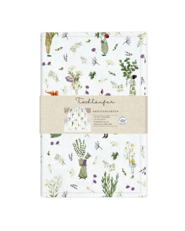 Tischläufer „Kräutergarten“ vom Grätz Verlag mit illustrierten Kräutern, Blumen und Figuren im typischen Stil von Silke Leffler