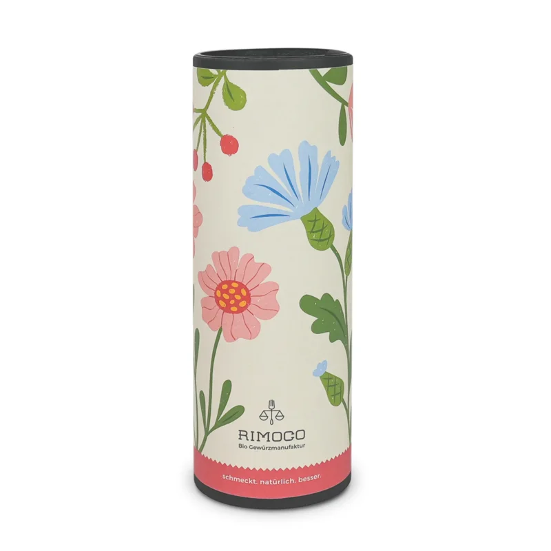 Geschenkverpackung mit buntem Blumenmuster für 3 Rimoco-Gewürze, Logo am unteren Rand sichtbar.