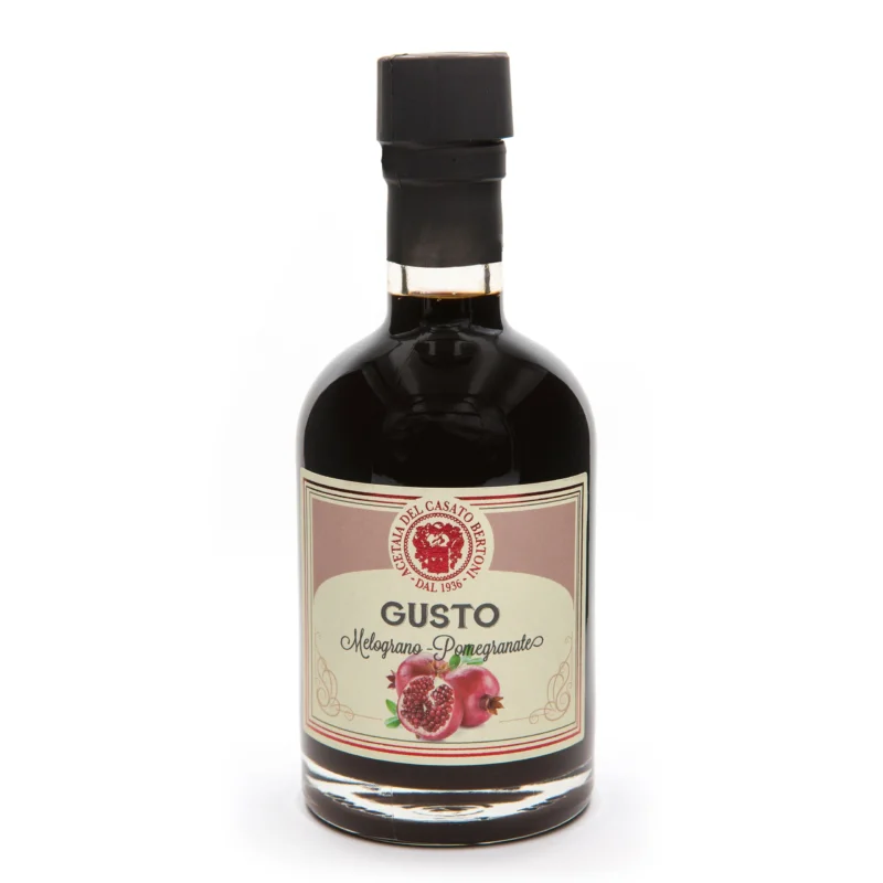 Bertoni Granatapfel-Balsamico Condimento Flasche mit Wachssiegel und Granatapfelbild auf dem Etikett.