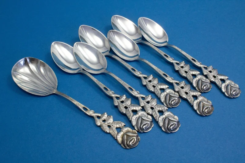 6 small mocha spoons with a matching sugar spoon