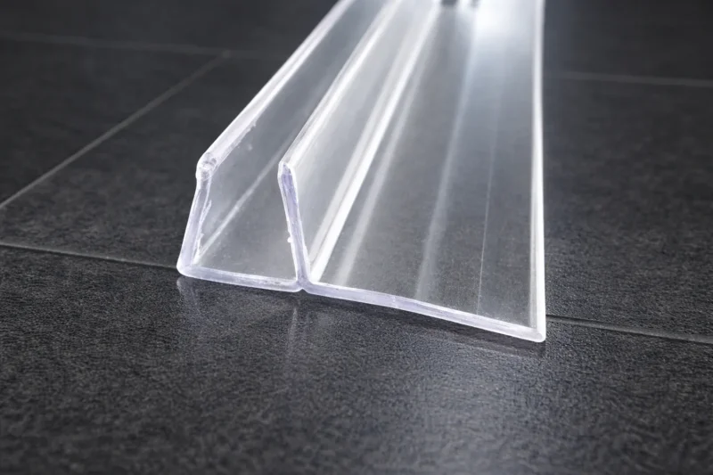 Polycarbonat-Überlappungsdichtung mit 90° Vinyl-Lippe für Schiebetüren, Art.Nr. 0890/1090