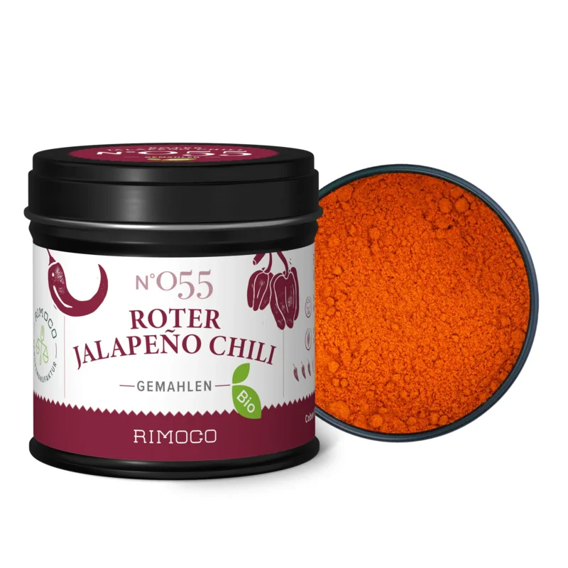Bio Roter Jalapeño Chili gemahlene Dose mit offenem Deckel und leuchtend rotem Chilipulver innen.